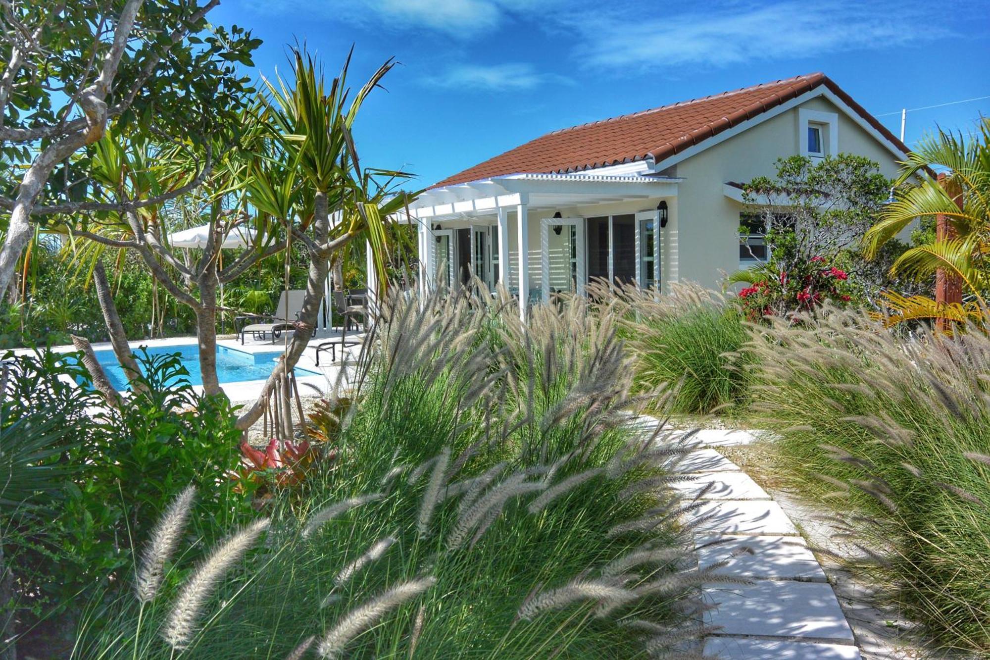Esencia Cottage Long Bay ภายนอก รูปภาพ